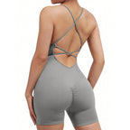 Gray romper with criss-cross back design on a white background