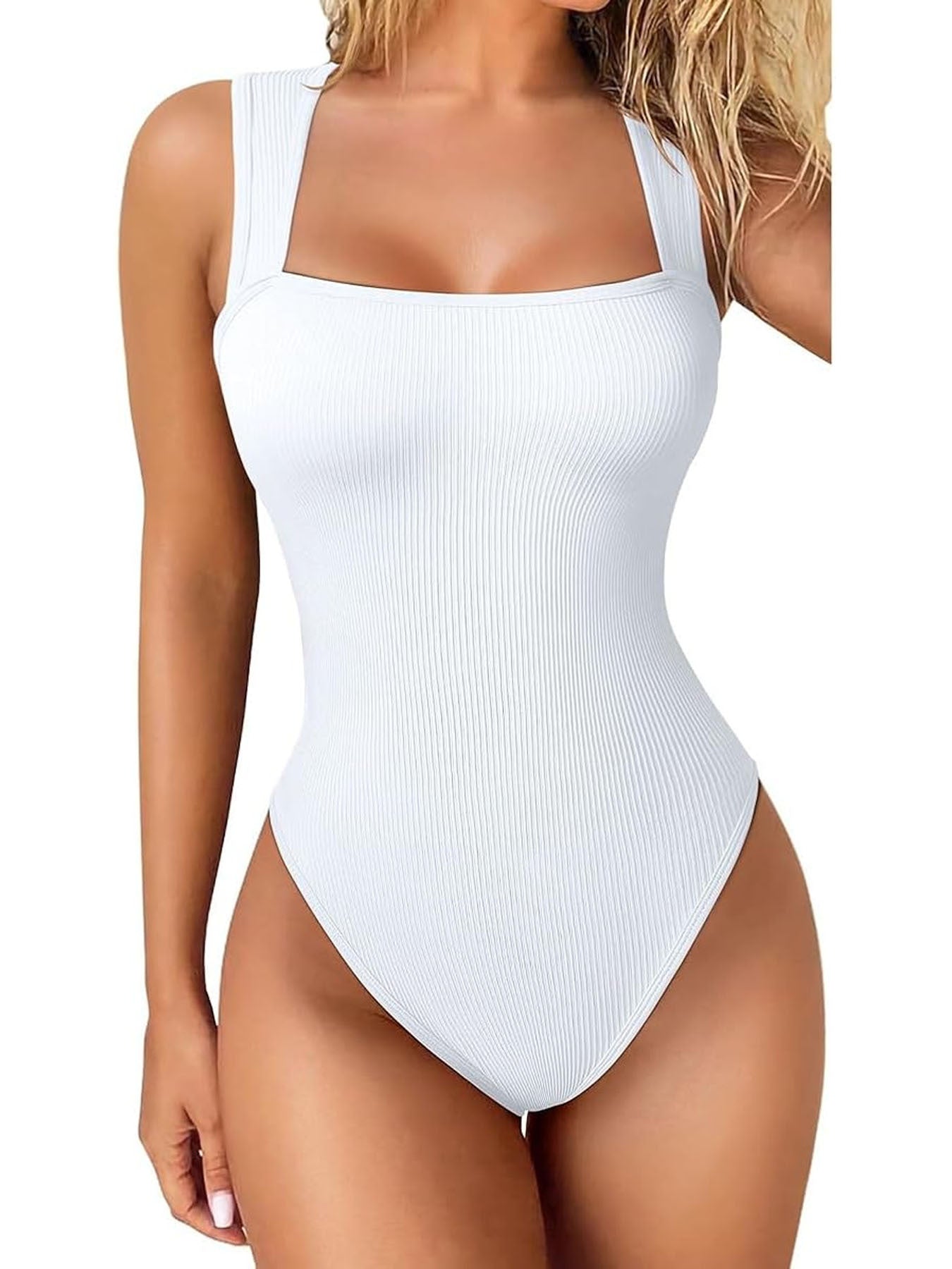 White ribbed bodysuit worn by a model on a white background