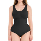 Black bodysuit worn by a model on a white background