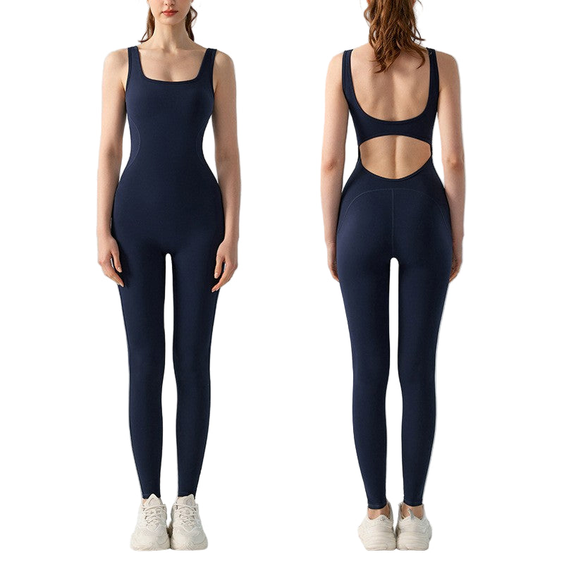 Navy blue bodysuit with cut-out design on a gray background