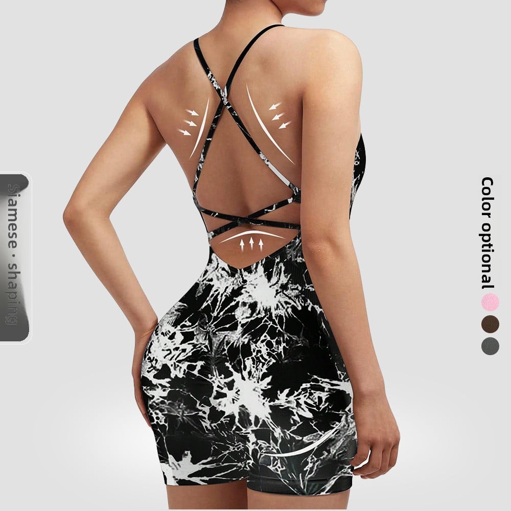 Black and white patterned romper on a model with color options displayed.
