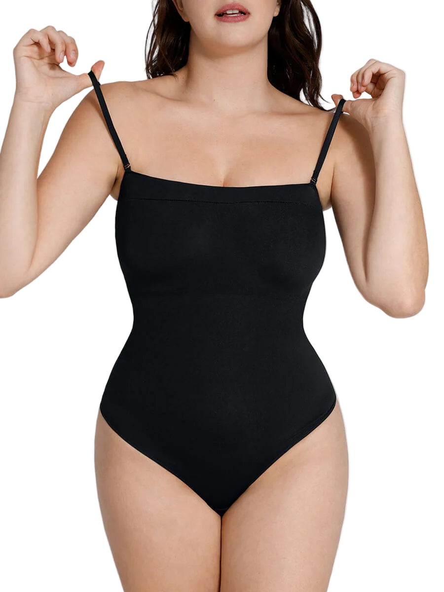 Black bodysuit worn by a model on a plain background