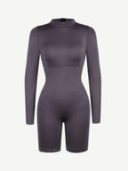 Gray bodysuit with long sleeves on a white background