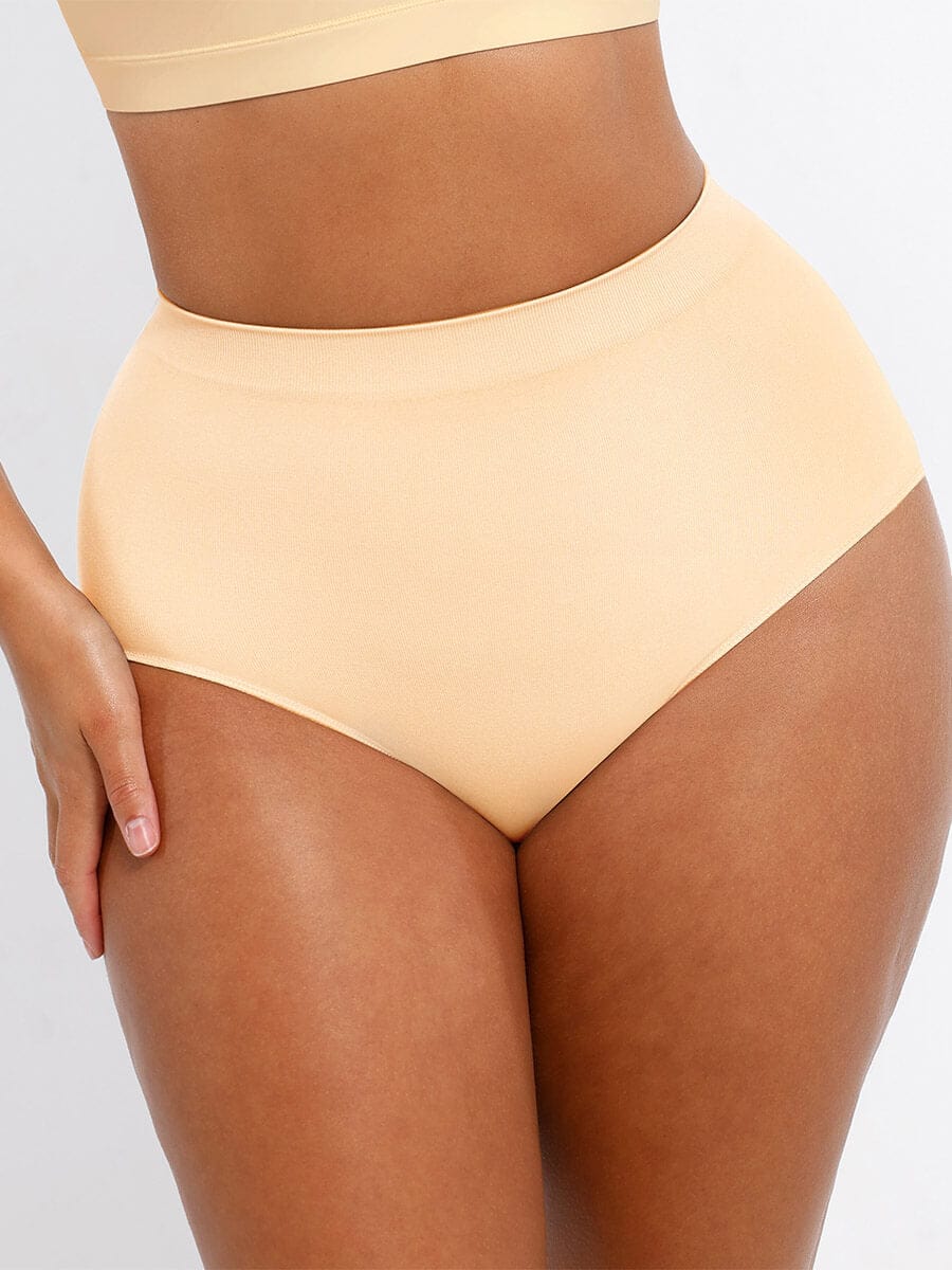 Beige high-waisted bikini bottom on a neutral background