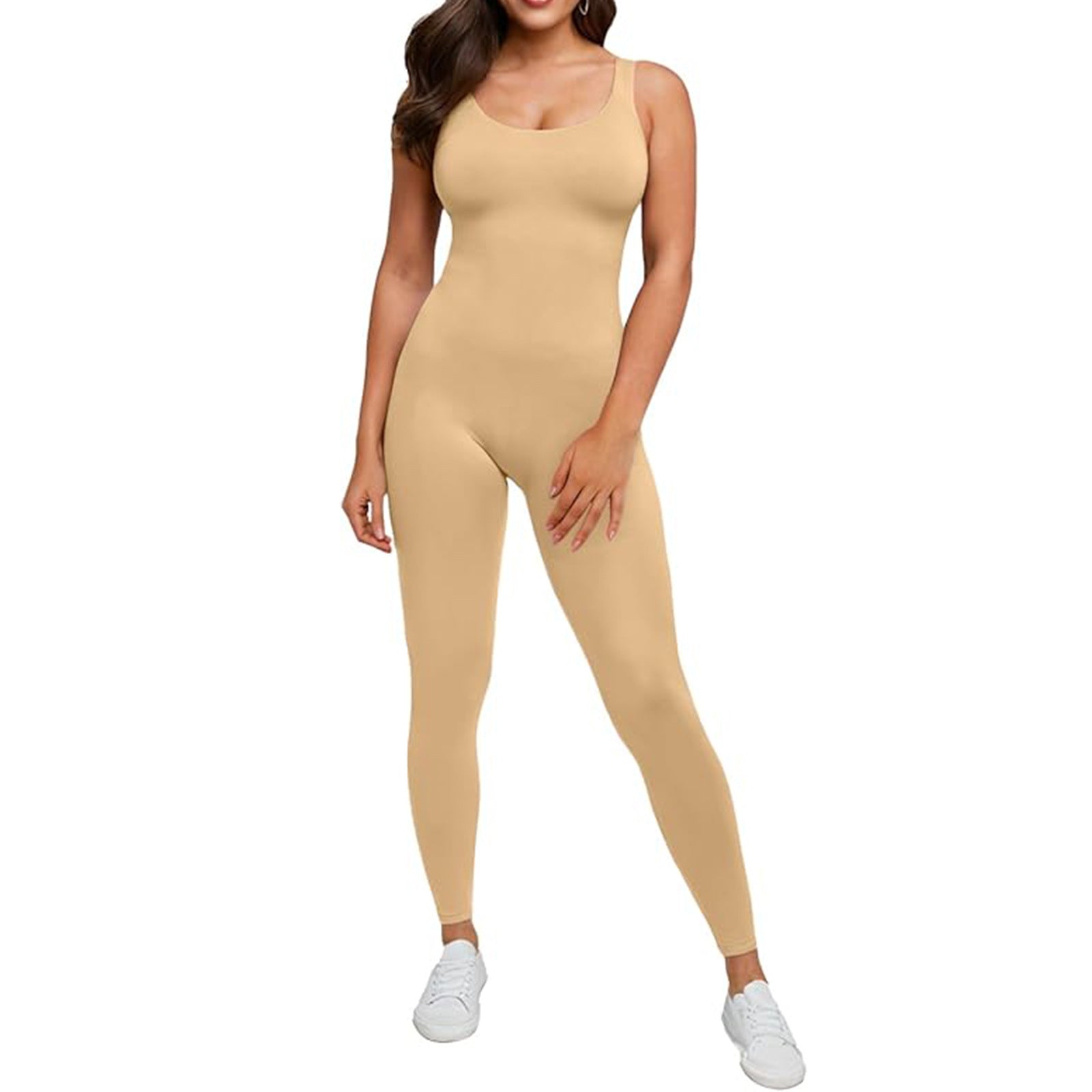 Beige bodysuit worn by a model on a white background