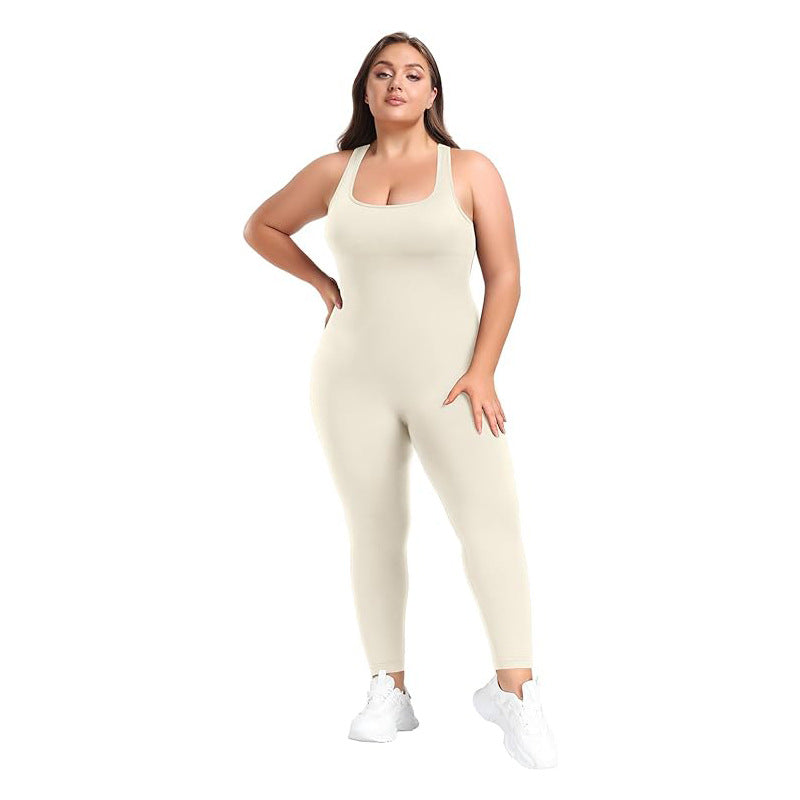 Woman wearing a beige jumpsuit on a white background