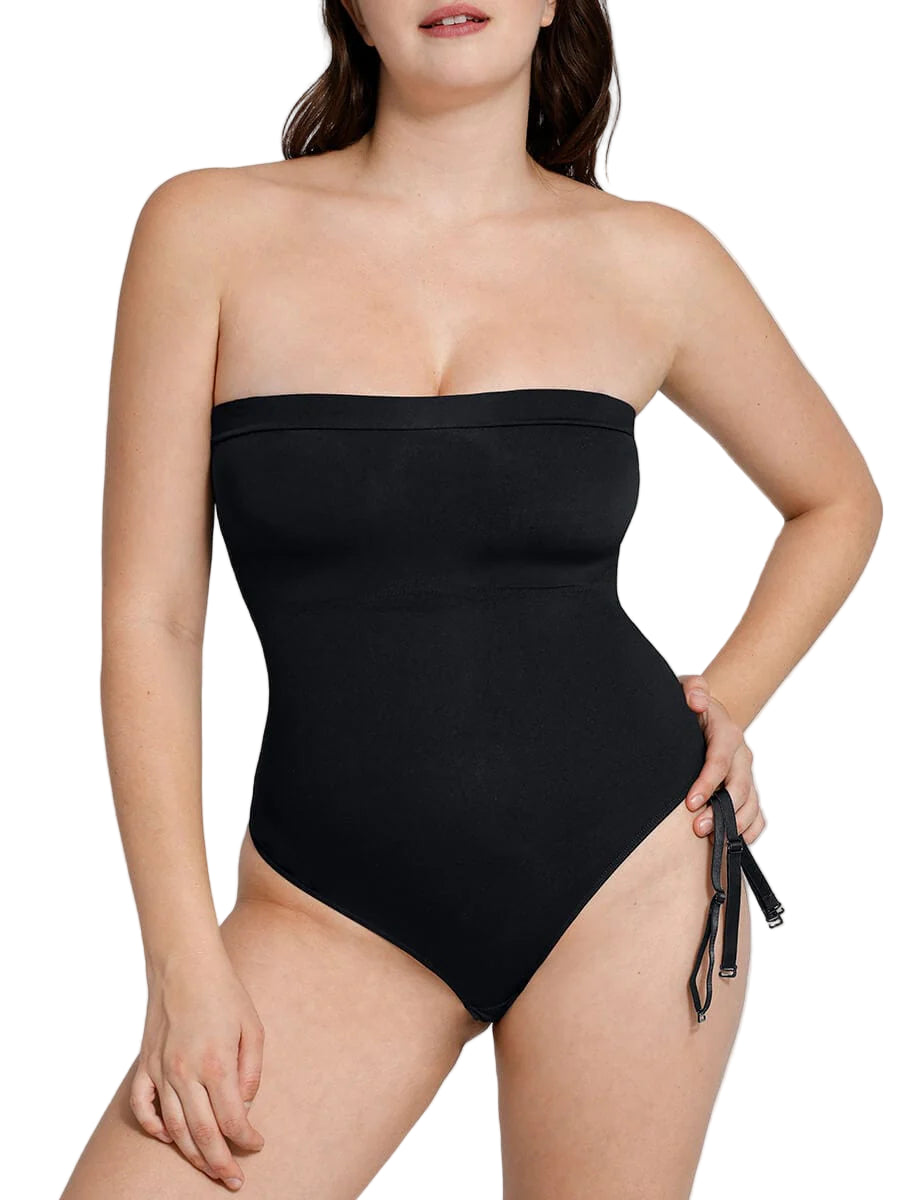 Black strapless swimsuit worn by a model on a plain background