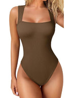 Brown ribbed swimsuit worn by a model on a white background
