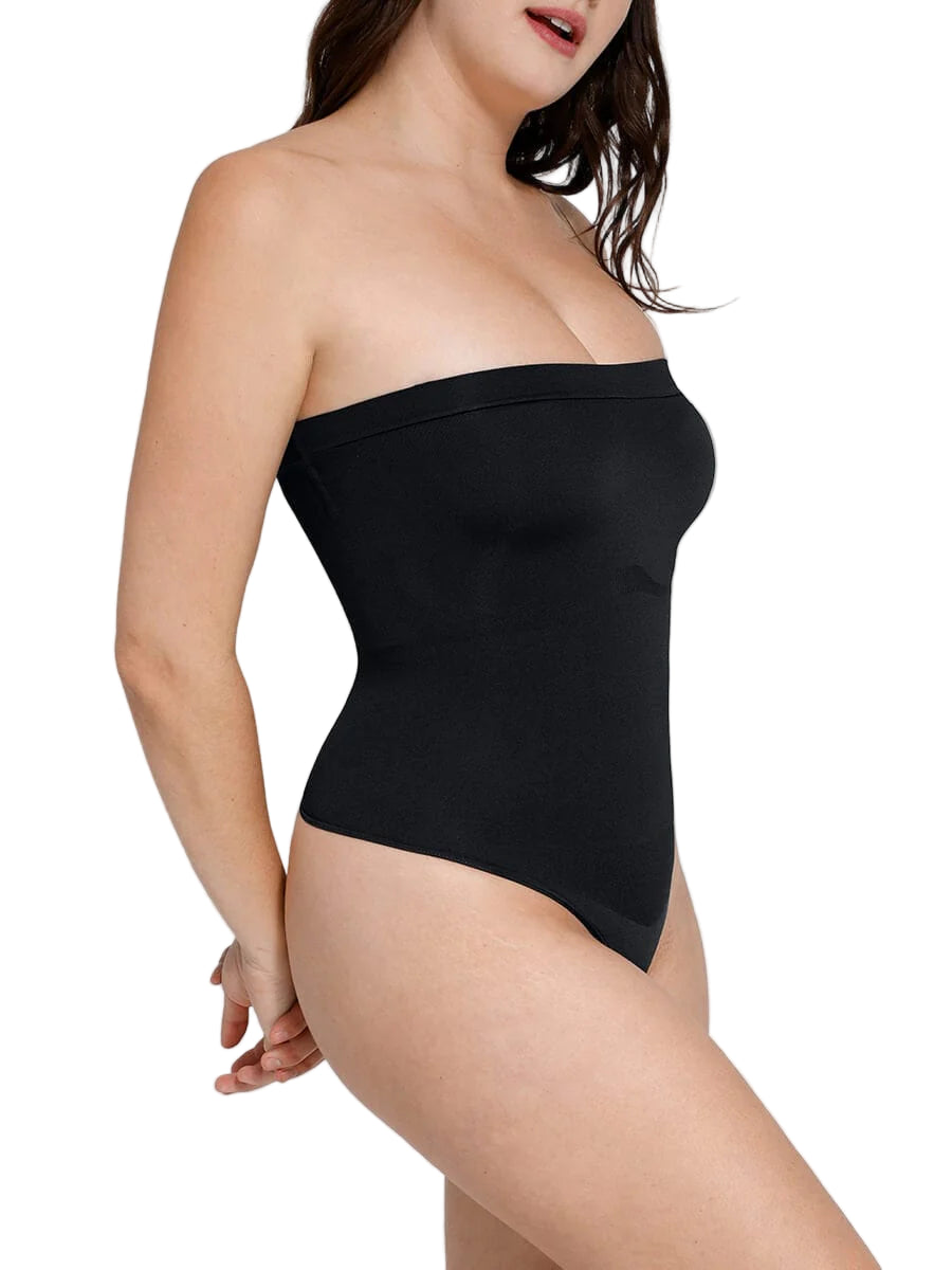 Black strapless bodysuit worn by a model on a white background