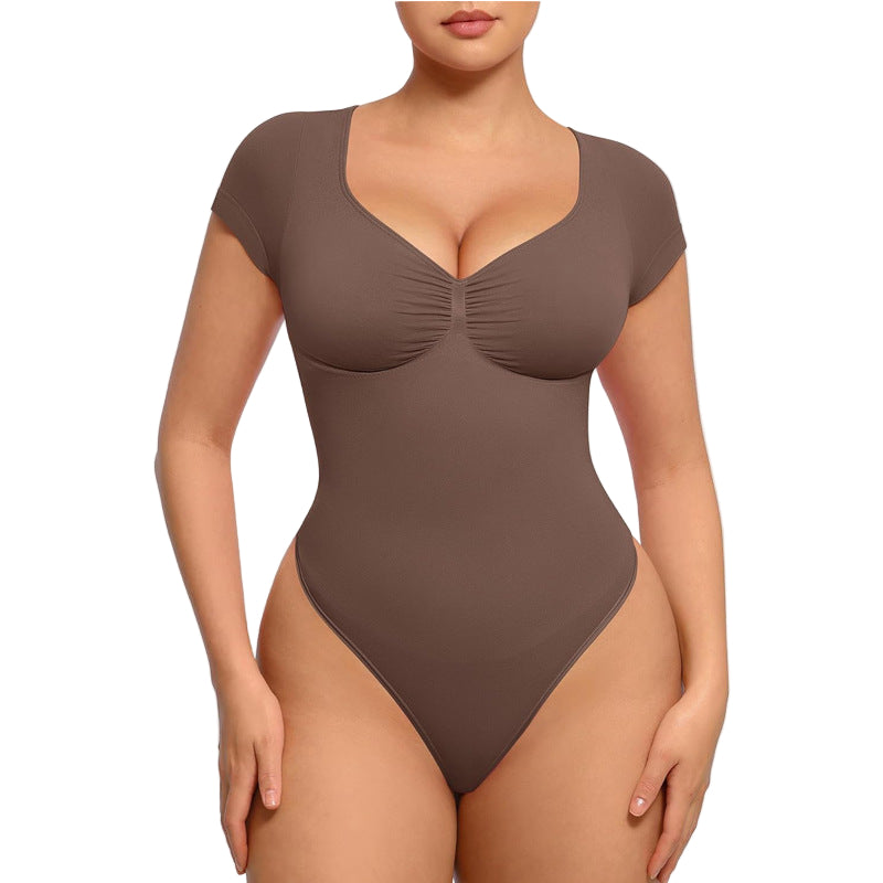 Brown bodysuit worn by a model on a white background