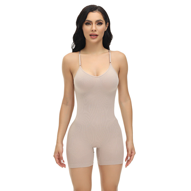 Woman wearing a beige shapewear bodysuit on a white background