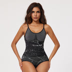 Woman wearing a black and gray patterned bodysuit on a white background