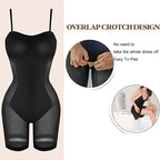 Black bodysuit with overlap crotch design on a beige background