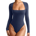 Navy blue swimsuit with long sleeves on a white background