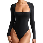 Black bodysuit with long sleeves on a white background