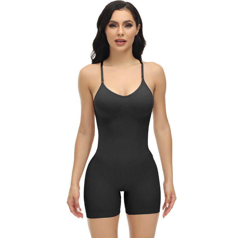Woman wearing a black bodysuit against a white background