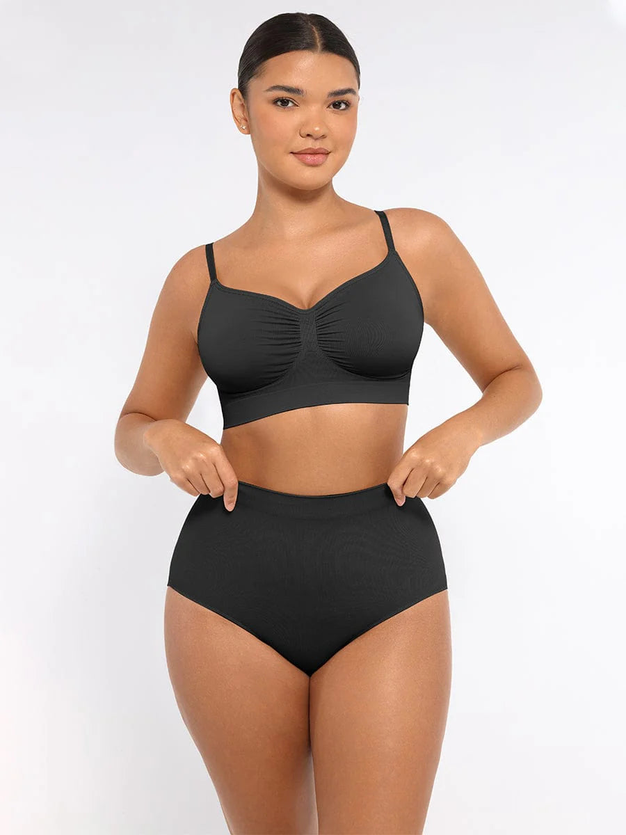 Woman wearing a black bikini set on a white background