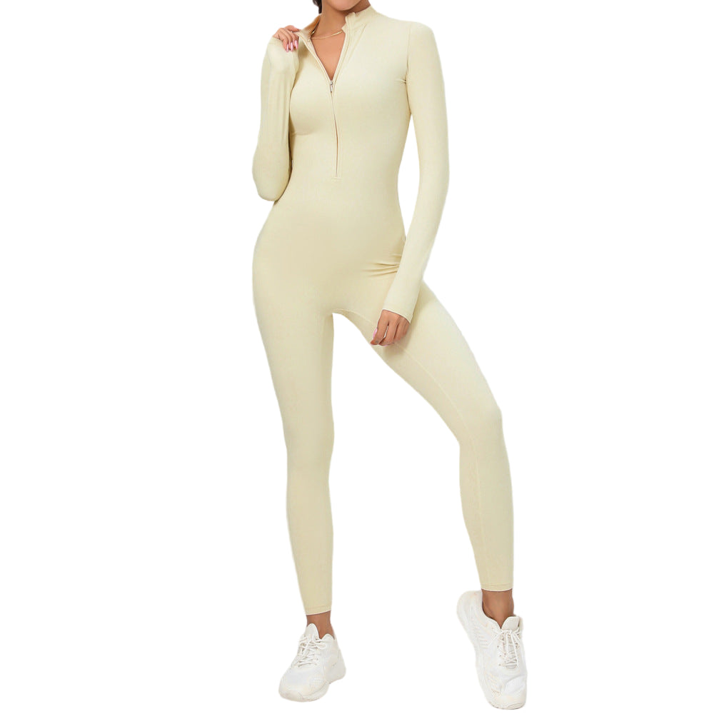 Person wearing a light yellow bodysuit on a gray background