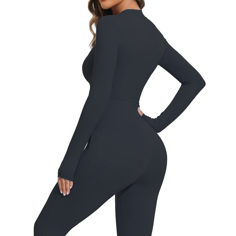 Black long-sleeve jumpsuit worn by a model on a light gray background