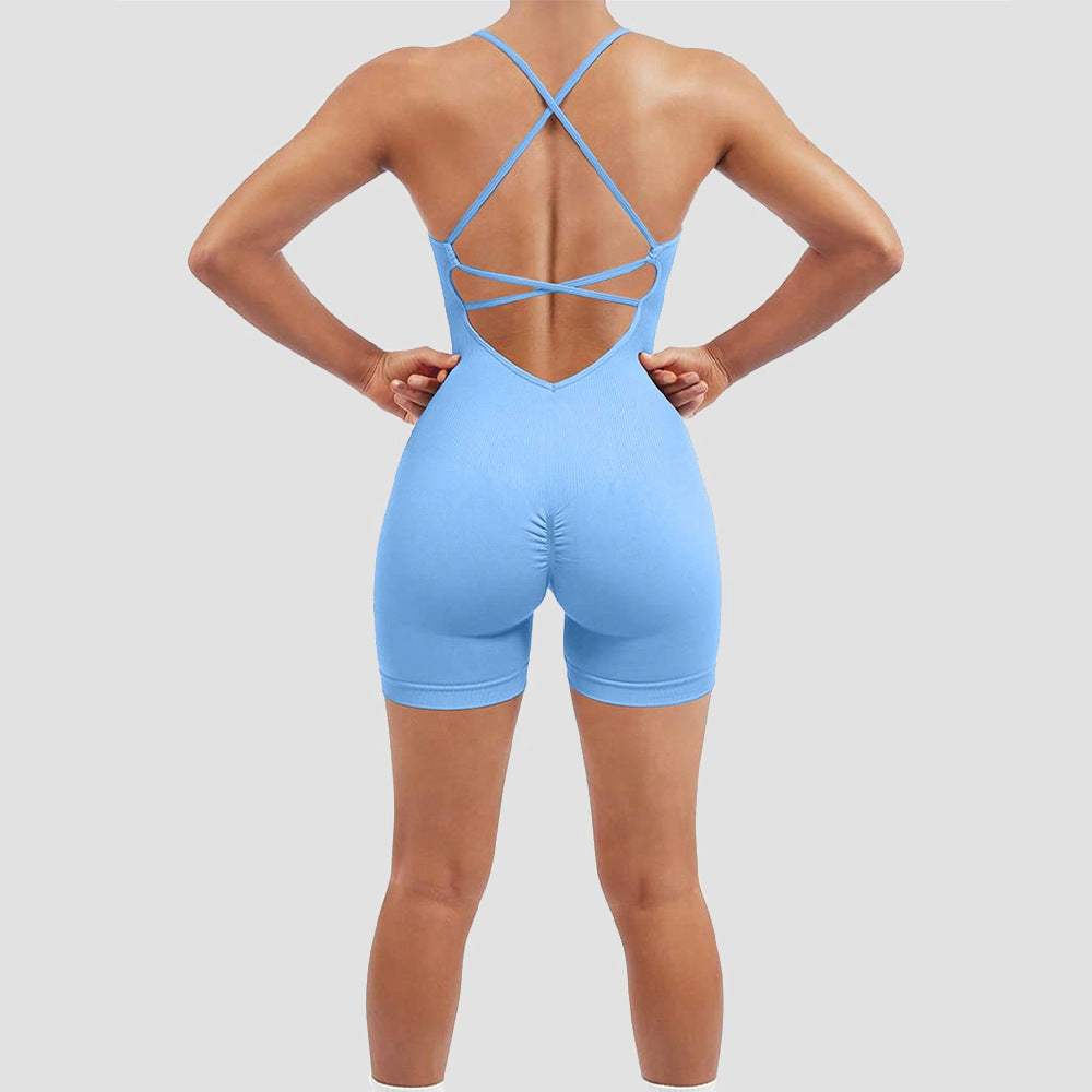 Light blue bodysuit with criss-cross back design on a plain background