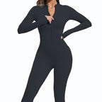 Black bodysuit worn by a model on a white background