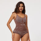 Woman wearing a brown bodysuit on a white background