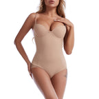 Beige bodysuit worn by a model on a white background