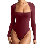 Maroon bodysuit with long sleeves on a white background