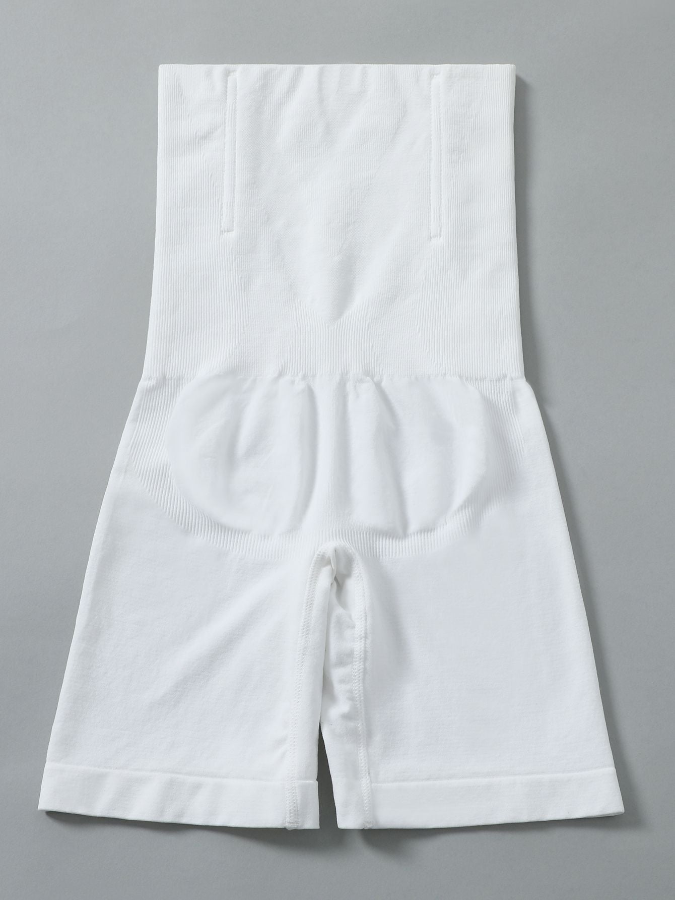 White shorts on a gray background