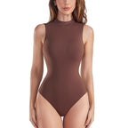 Brown swimsuit worn by a model on a light gray background