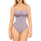 Woman wearing a lavender bodysuit on a white background