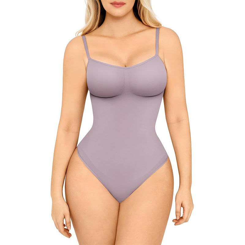 Woman wearing a lavender bodysuit on a white background