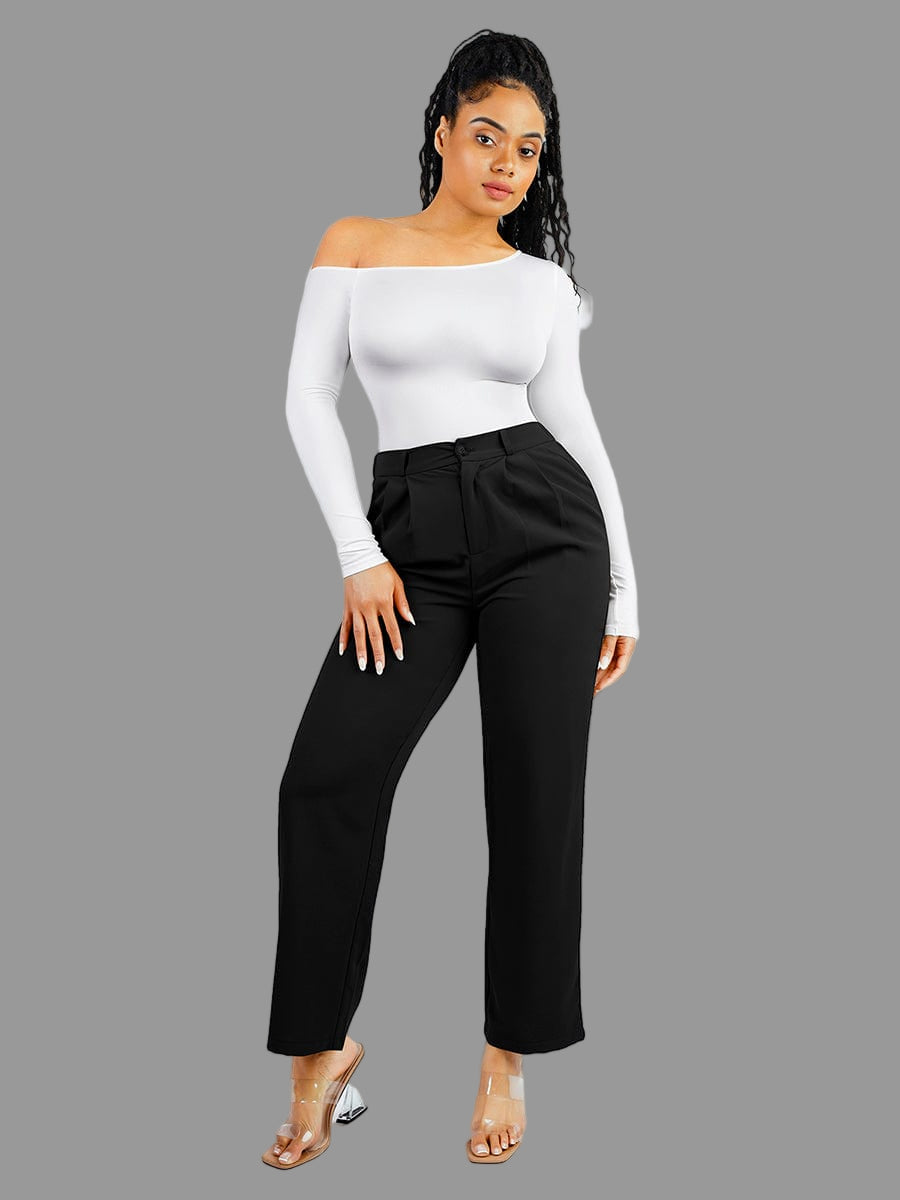 Woman wearing a white off-shoulder top and black high-waisted pants on a white background