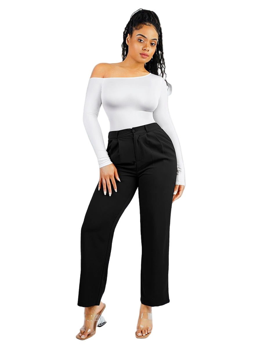Woman wearing a white off-shoulder top and black high-waisted pants on a white background