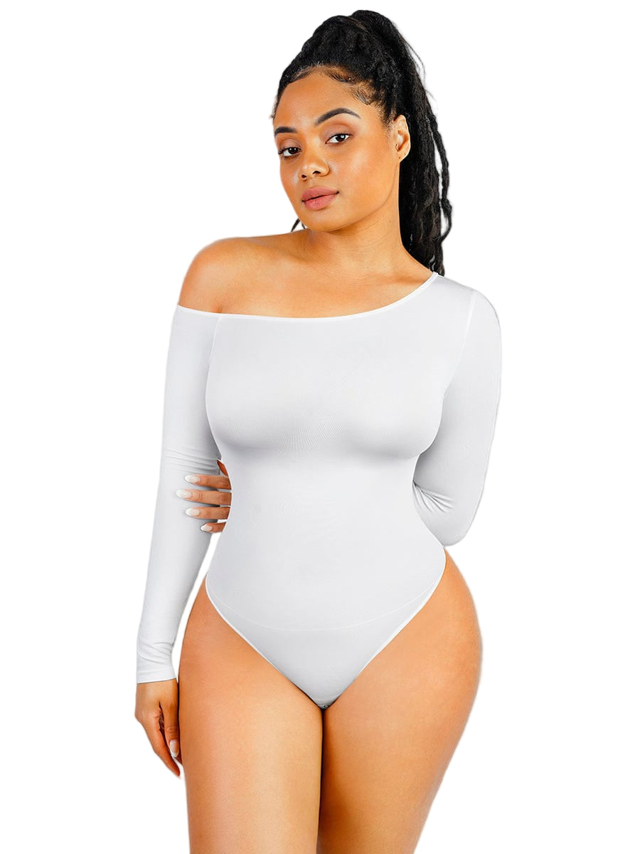 Woman wearing a white off-shoulder bodysuit against a plain background